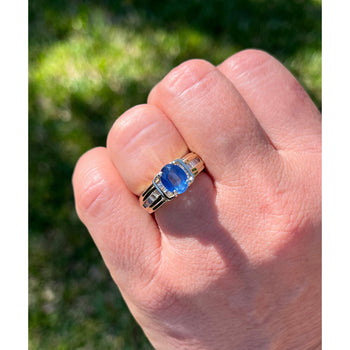 1.22 Carat Oval Cut Blue Sapphire with Baguette Cut Diamonds in 14k Gold Ring – Assay Jewelers