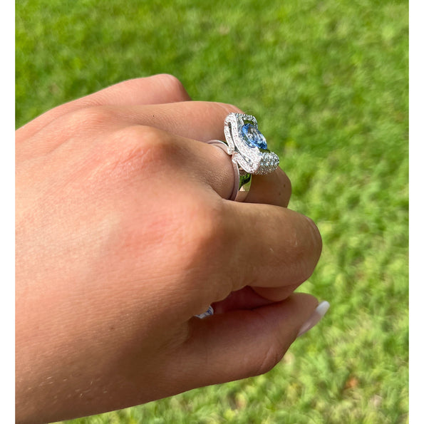 2.20 Carat Oval Cut Tanzanite Half Bezel Bow Style Ring in 18K White Gold