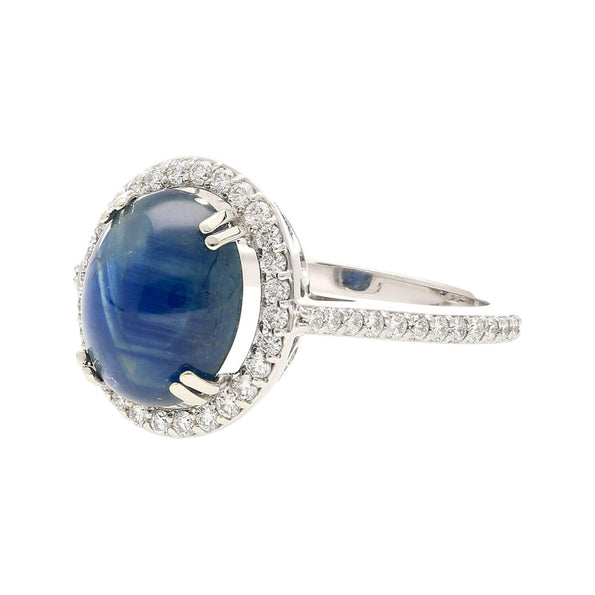 2.80 Carat Oval Cabochon Blue Star Sapphire and Diamond Halo Ring
