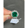 5.20 carat Minor Oil Colombian Emerald and Diamond Halo Ring