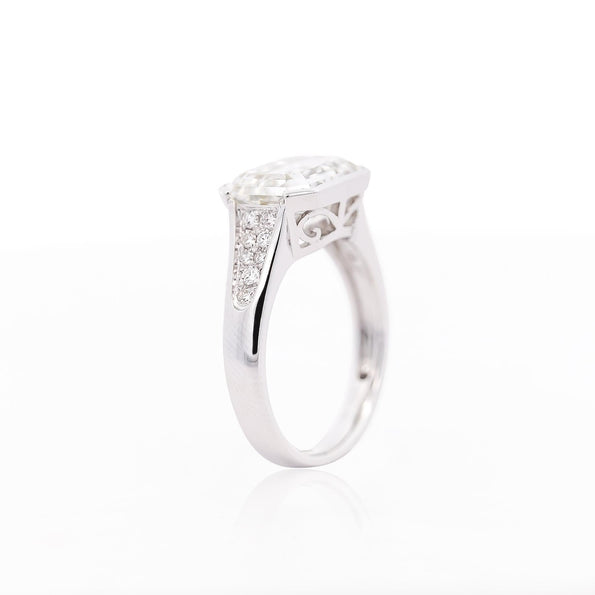 5.53 Carat Emerald Cut Lab Grown Diamond Half Bezel White Gold Ring