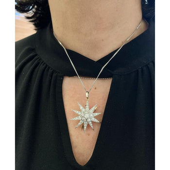 Dreicer & Co. ancien pendentif ou broche en forme d’étoile en diamant taille euro, en or 18 kt et platine – Assay Jewelers