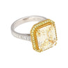 Emerald Cut Natural 7.25 Carat Fancy Light Yellow Diamond with Round Diamond Halo Ring