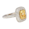 GIA Certified 2.35 Fancy Yellow Diamond Ring With 1.0 CTW Diamond Cluster in 18K White Gold