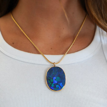 GIA Certified 35 Carat Marcus & Co Australian Black Opal in 18K Gold Pendant – Assay Jewelers