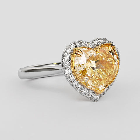 GIA Certified 5.03 Carat Fancy Yellow Heart-Shaped Diamond & Halo 18K Gold Ring