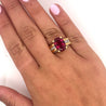 GIA Certified Oval Cut 7 Carat Purplish Red Tourmaline Ring with Diamond Sides in 18K Gold