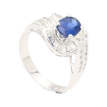 Natural 1.14 Carat Oval Cut Blue Sapphire with Round & Baguette Cut Diamonds in a Swirled 18K White Gold Ring Setting – Assay Jewelers