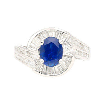Natural 1.14 Carat Oval Cut Blue Sapphire with Round & Baguette Cut Diamonds in a Swirled 18K White Gold Ring Setting – Assay Jewelers