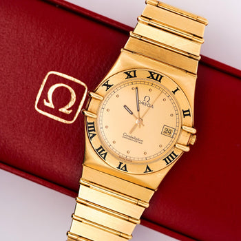 Omega Constellation Manhattan 18K Gold Roman Numeral Bezel Champagne Dial Watch – Assay Jewelers