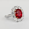 Rare Vivid Red 5.81 Carat Oval Cut Siam Ruby & Diamond Halo Ring