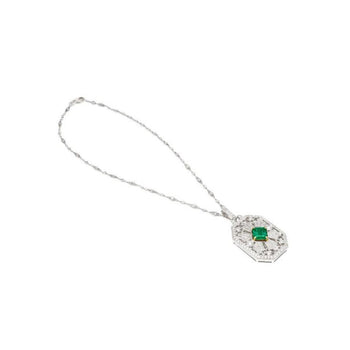 Vintage Carved Platinum 3.16 Carat Vivid Green Minor Oil Emerald Pendant with 4 CTTW in Diamonds – Assay Jewelers