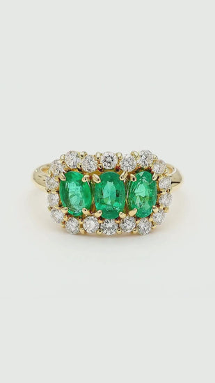 1.22 Carat Emerald & Diamond 18K Gold Halo Three Stone Band Ring